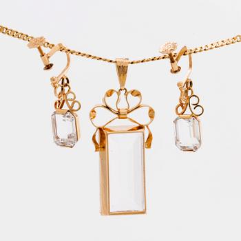 STIGBERT chainn and pendant and earrings, 18l gold and rock crystal.