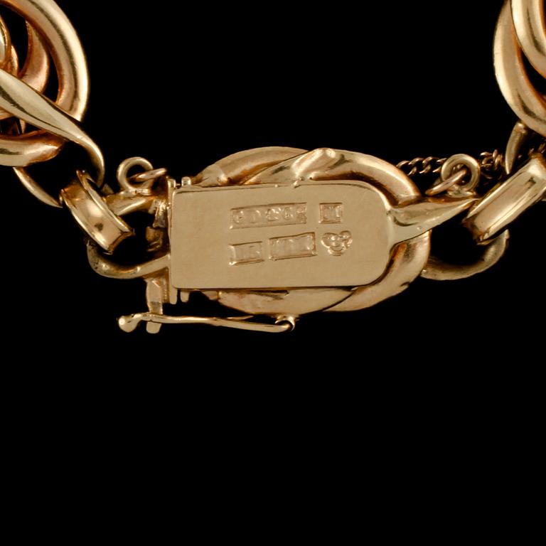 ARMLÄNK, 18k guld, Gustav Dahlgren & Co, Malmö, 1935. Vikt 13 g.