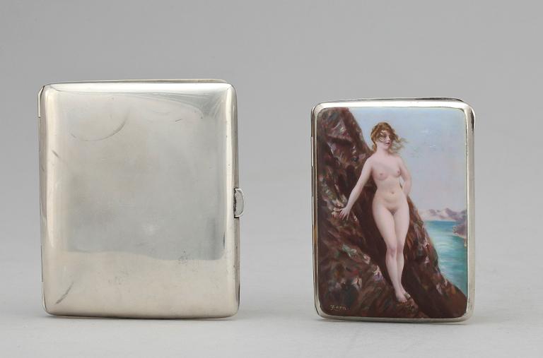 CIGARETTETUIN, 2 st, silver och emalj, bla C G Hallberg, 1900-talets början.