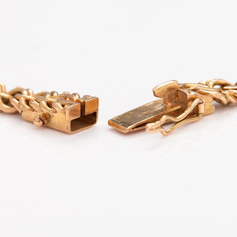 A 14K gold necklace. Russian hallmarks.
