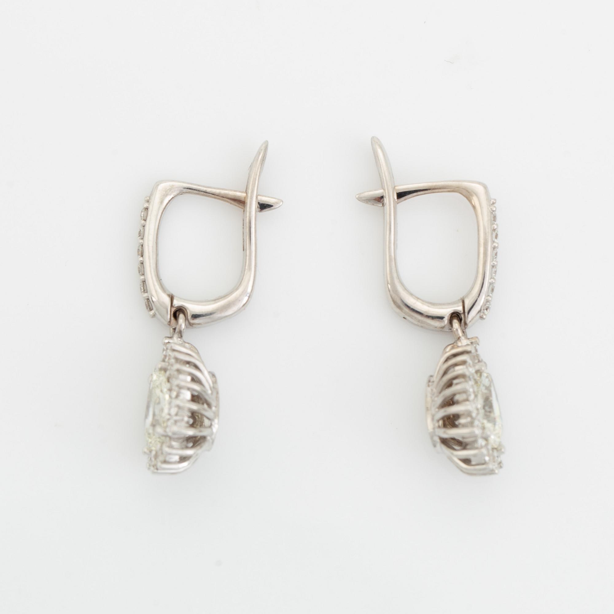 Pear shaped diamond earrings.