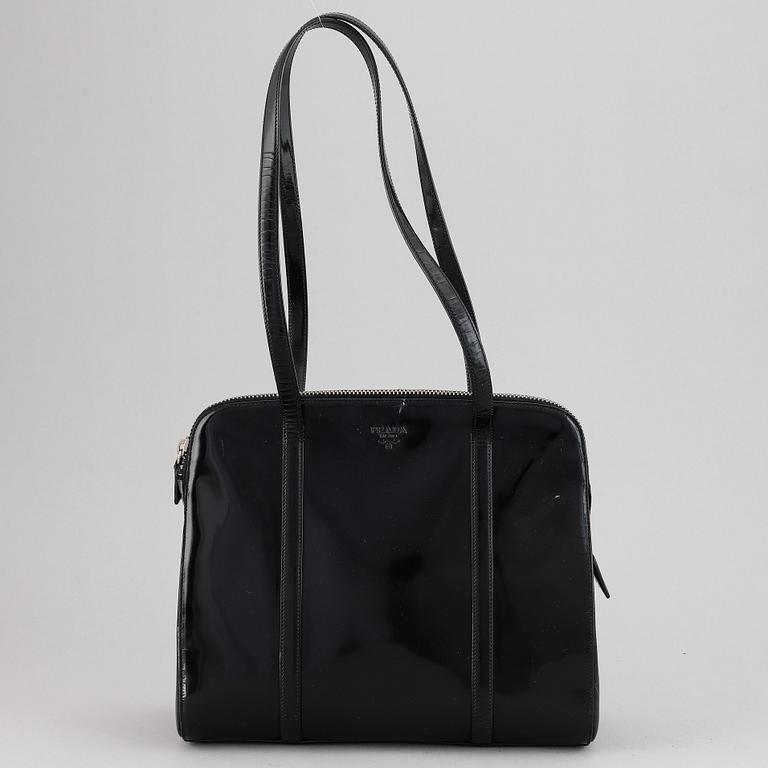 Prada, a patent leather bag.