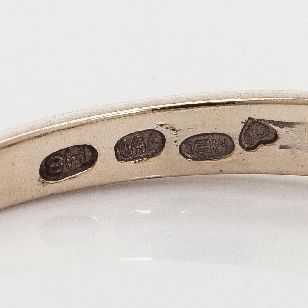 Ring, three brilliant cut diamonds, 18K white gold, H. Lahtinen & Co., 1985.
