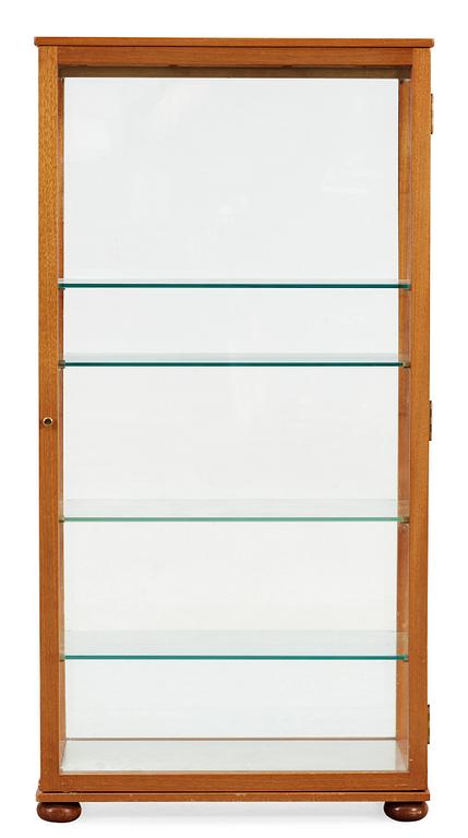 A Josef Frank mahogany and glass cabinet by Svenskt Tenn, model 649.