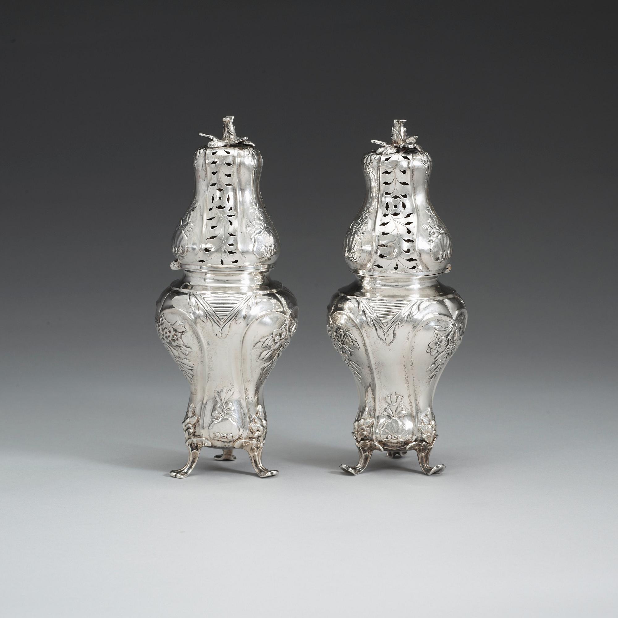A Swedish 18th century silver sugar-casters, marked Lorentz Lindgren, Borås 1779, and one later copy with false marks.