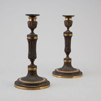 CANDLETICKS, a pair, bronze, France, ca 1800.