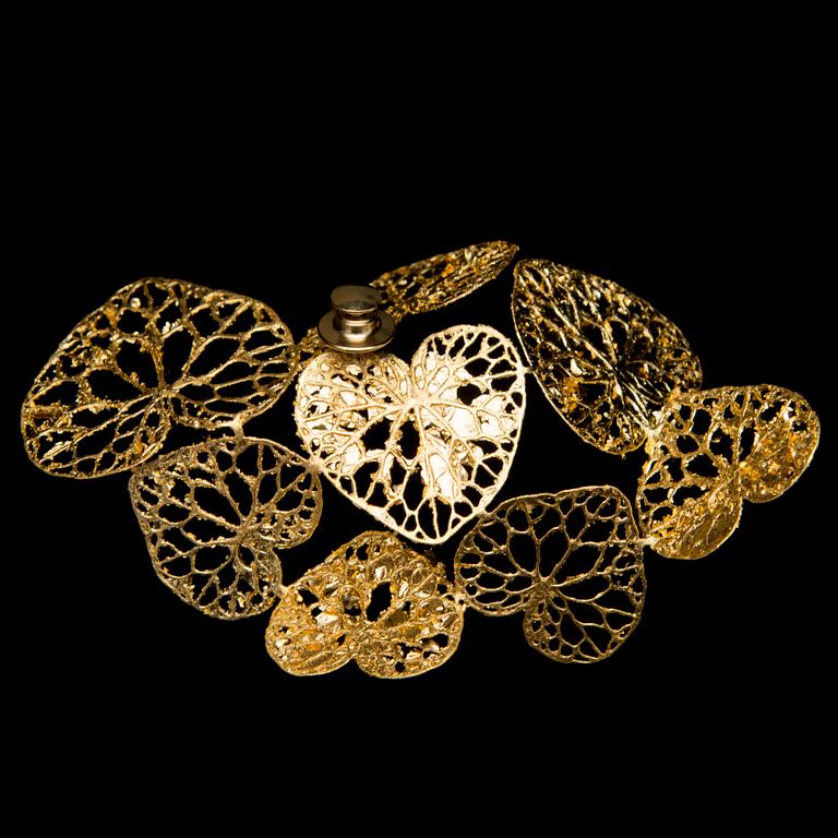 A MARIA JAUHIAINEN BROOCH, "cloud of Hearts", steel, 24K gold leaf, 2018.