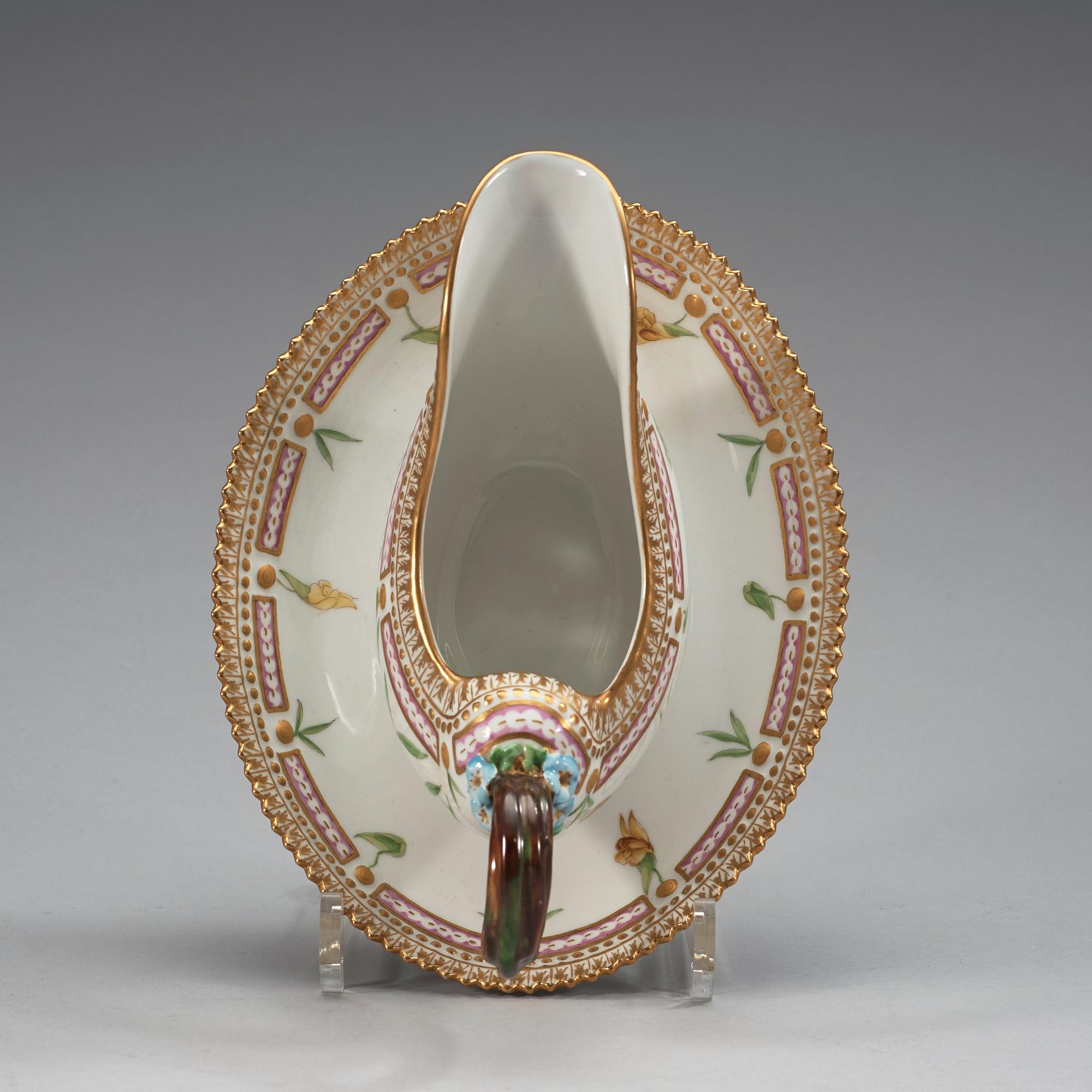 A set of three Royal Copenhagen 'Flora Danica' serving dishes and a sauce boat, Denmark, 20th Century.