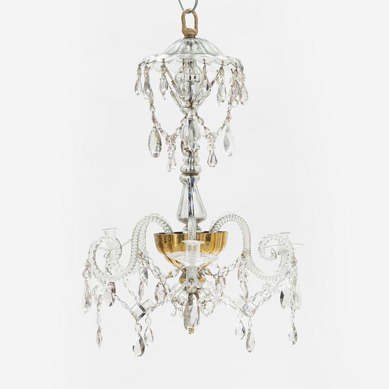 A European glass three-light chandelier, circa 1800.