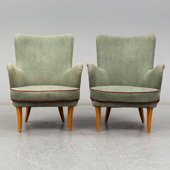 A pair of Swedish easy chairs, mid 20th Century.