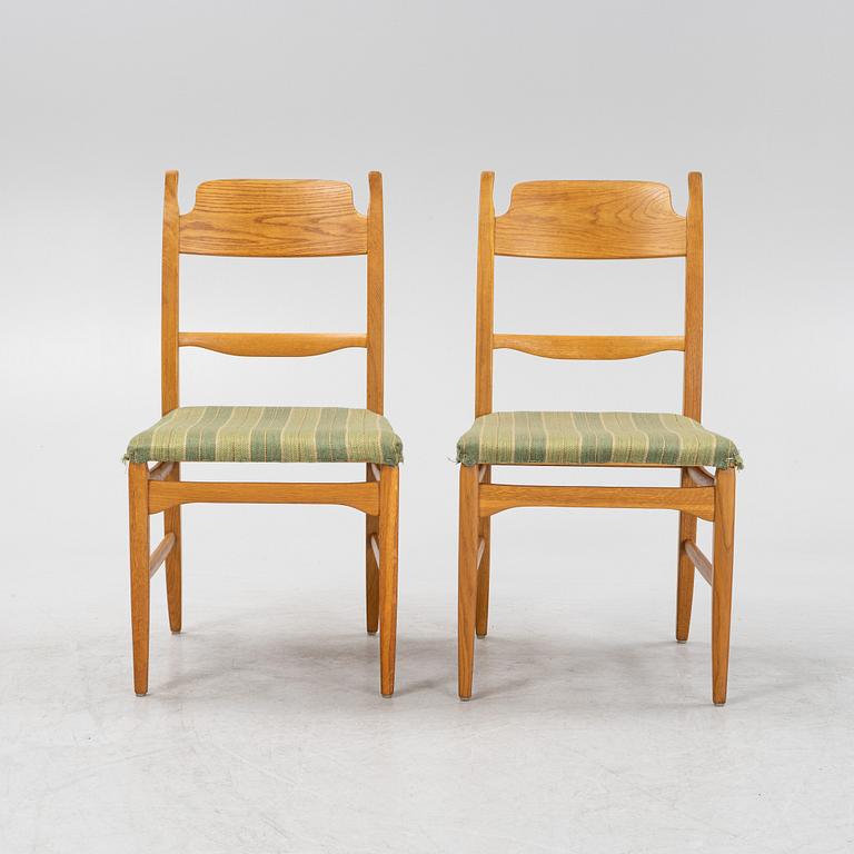 Carl Malmsten, a dining table and four chairs, 'Calmare nyckel', Åfors Möbelfabrik, second half of the 20th century.