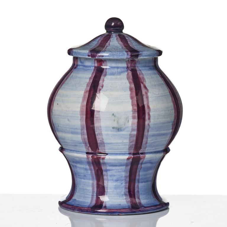 Wilhelm Kåge, a jar with cover, and four vases, creamware and porcelain, Gustavsberg, Sweden, 1917-1920.