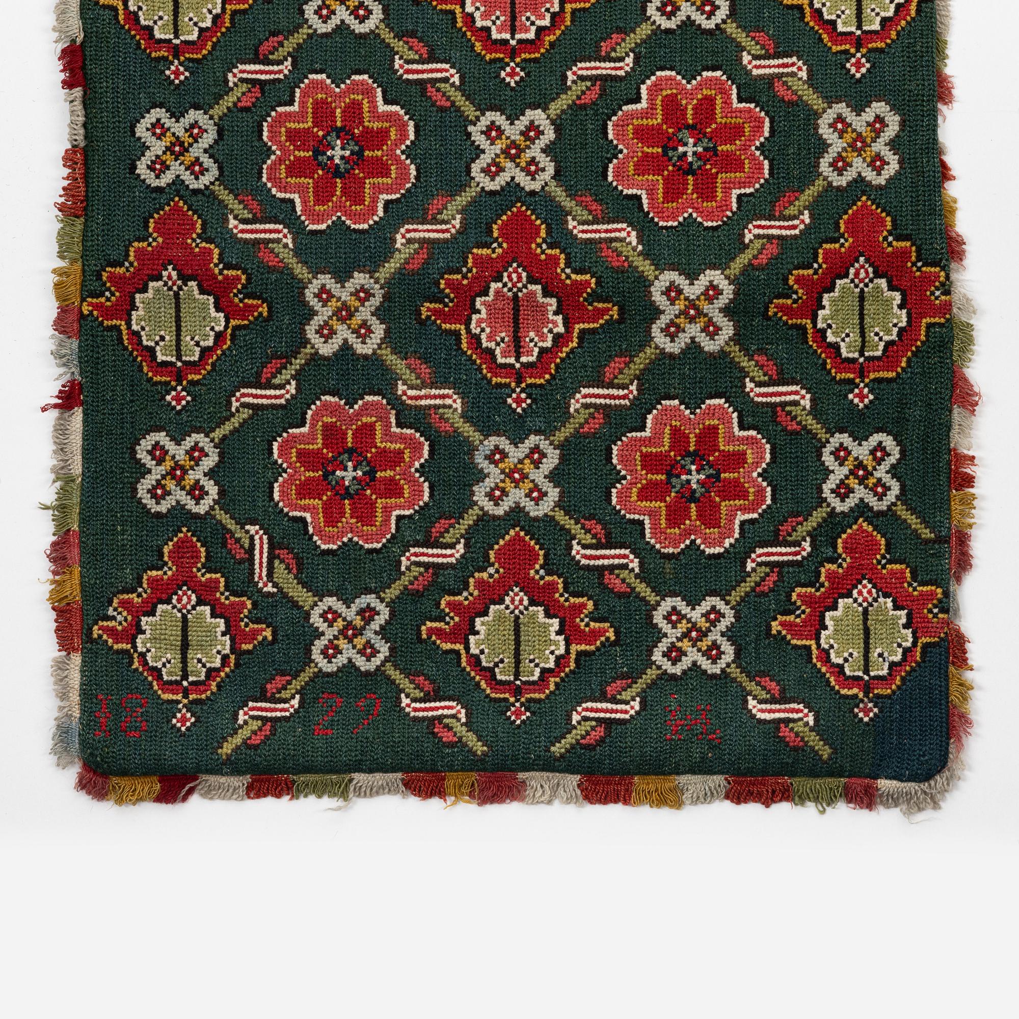 A twizt stich carrige cushion from Scania, 130 x 51 cm, Scania, dated 1822.