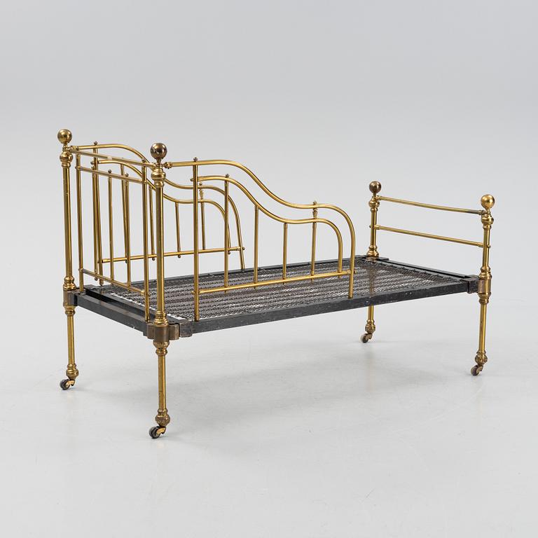 A Maple & Co children's bed, late 19th century, with the owner stamp of Gustav VI Adolf.