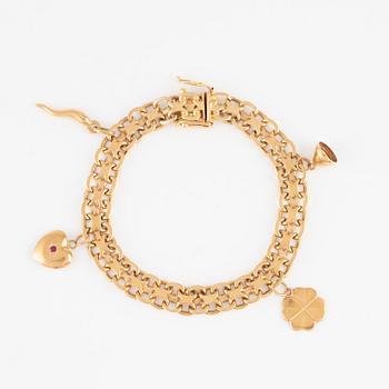 Bracelet 18K gold with charms.