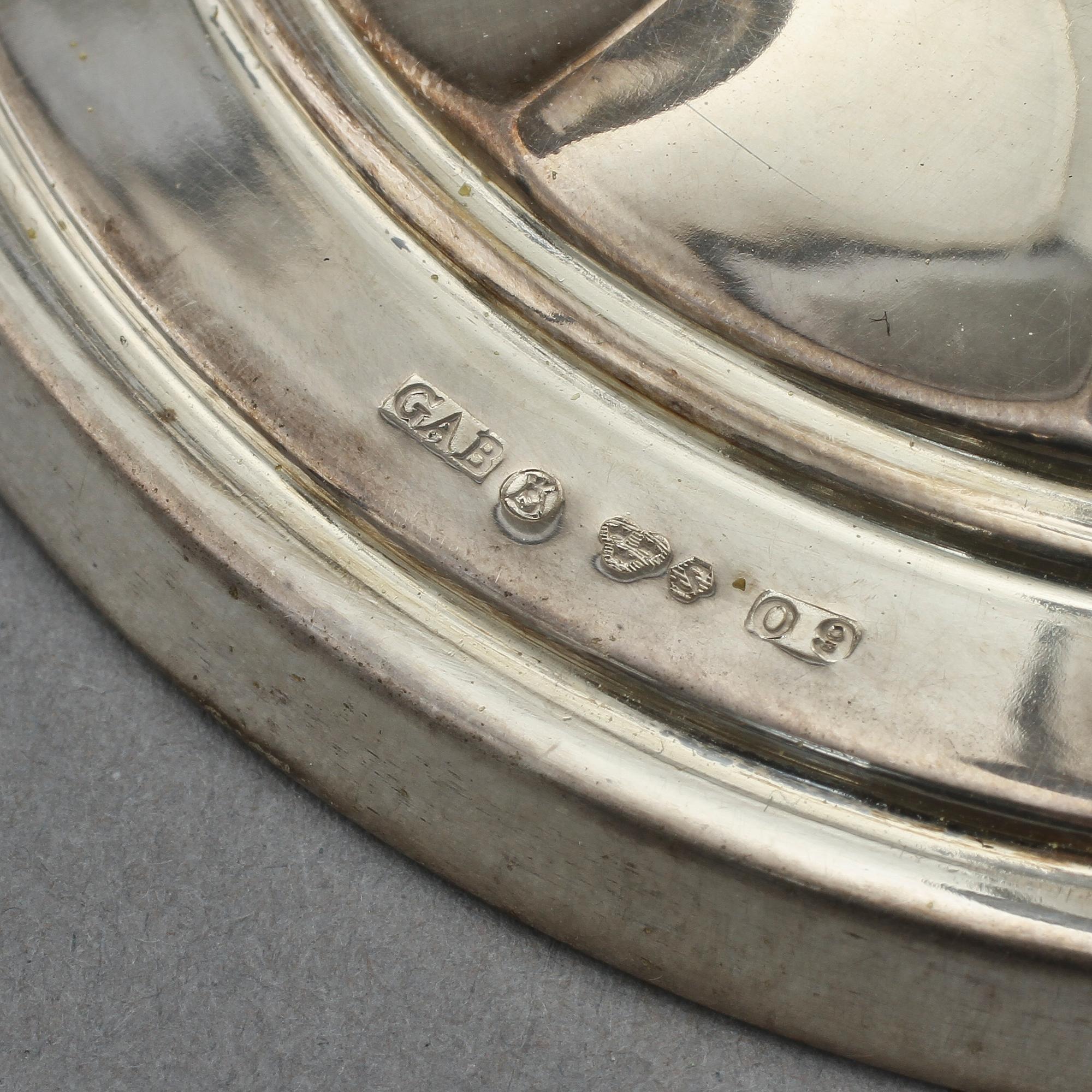 KANDELABER samt LJUSSTAKAR, ett par, CGH samt GAB, Stockholm, 1939 samt 1964. Tot vikt 785 g.