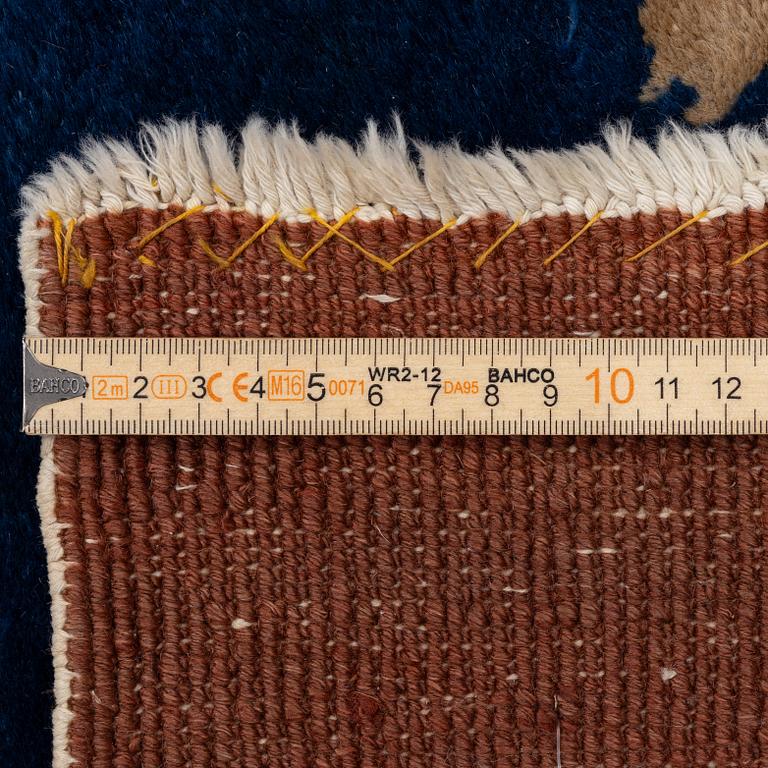 A Chinese art deco carpet, c. 327 x 278 cm.