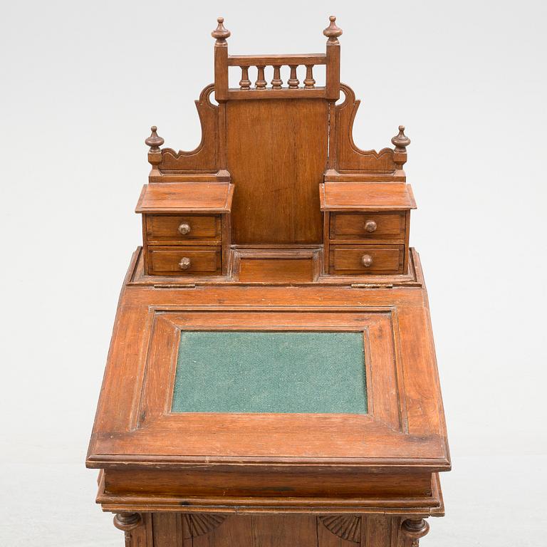 A DAVENPORT WRITING DESK, later part of the 20th century.