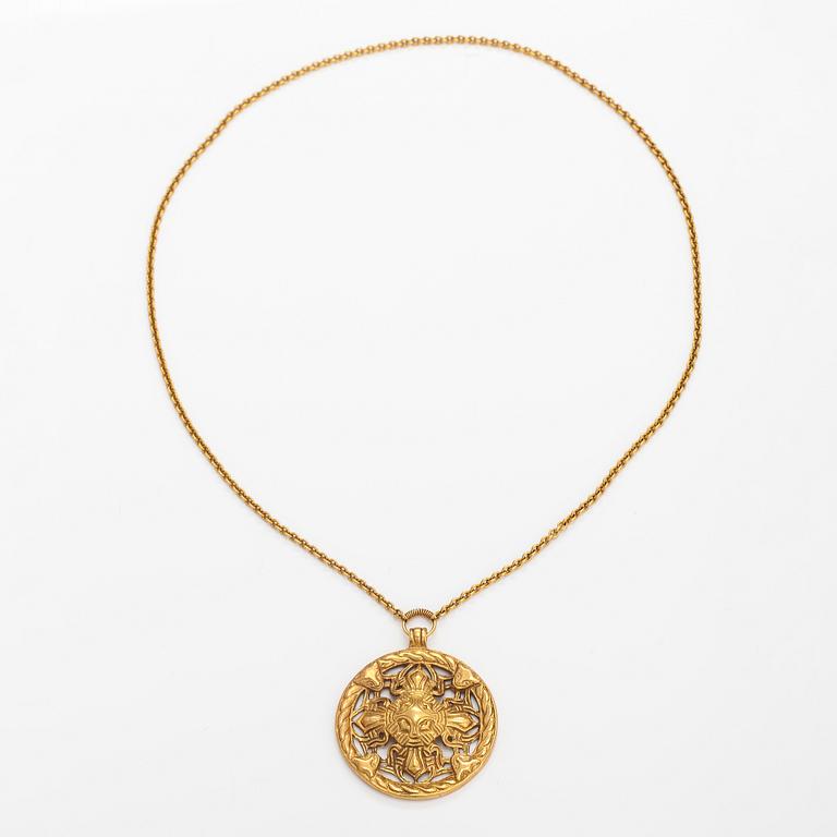 A gilded bronze neckalce "Åland pendant", model no. 67. Kalevala koru, Helsinki.