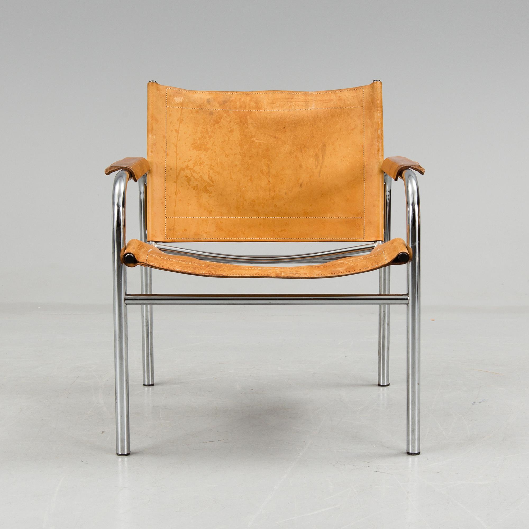 a leather and metal armchair, probably by IKEA.