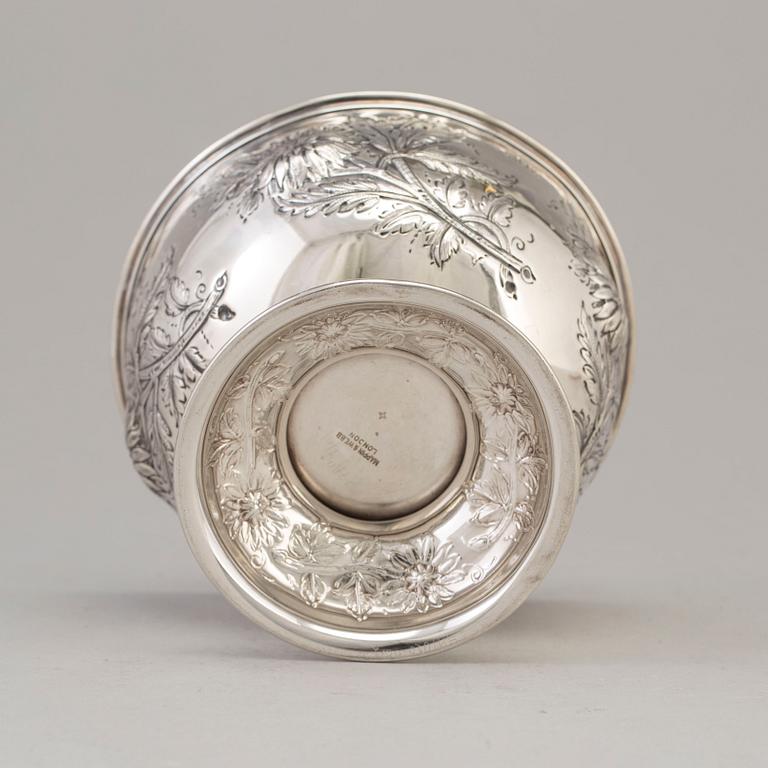 A footed silver bowl decorated with flowers, maker's mark Mappin & Webb. London 1904.
