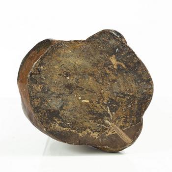 A Swedish folk art carved candlestick, 19th century.