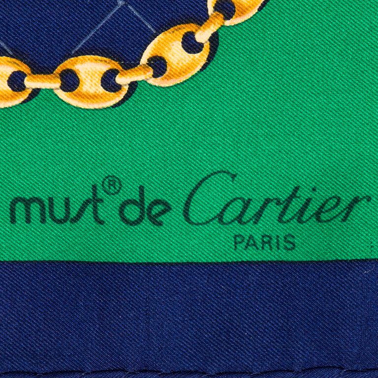 must de Cartier, a silk scarf.