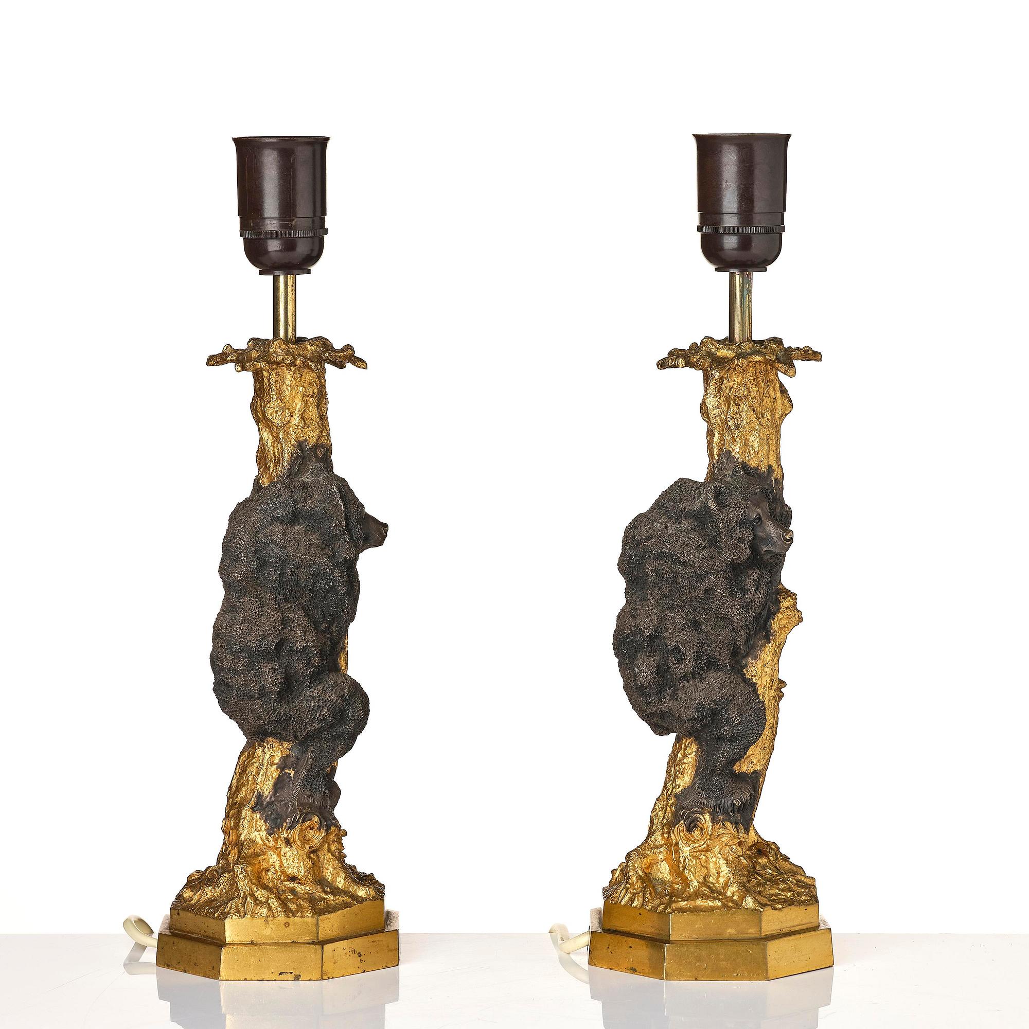 A pair of Russian Alexander III gilt and patinated bronze table lamps, late 19th century.
