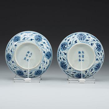 A pair of blue and white lotus dishes, Qing dynasty, Guangxu mark and period (1874-1908).