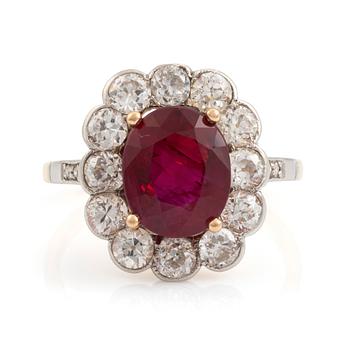 An 18K gold and platinum ring set with a faceted ruby weight ca 3.35 cts.