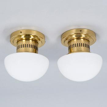 Klaus Michalik, A pair of 1960s wall/ceiling lights, 'Bau' model 971-504/H for Stockmann Orno, Finland.