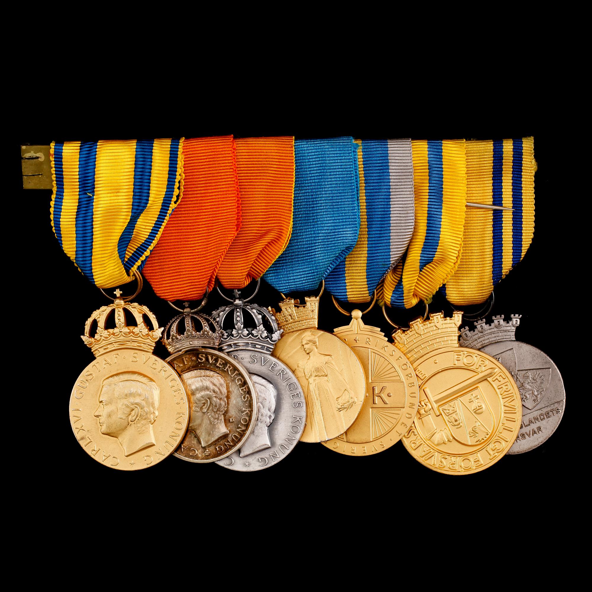 MEDALJER, 7 st, silver samt förgyllt silver. Total vikt ca 160 gram.