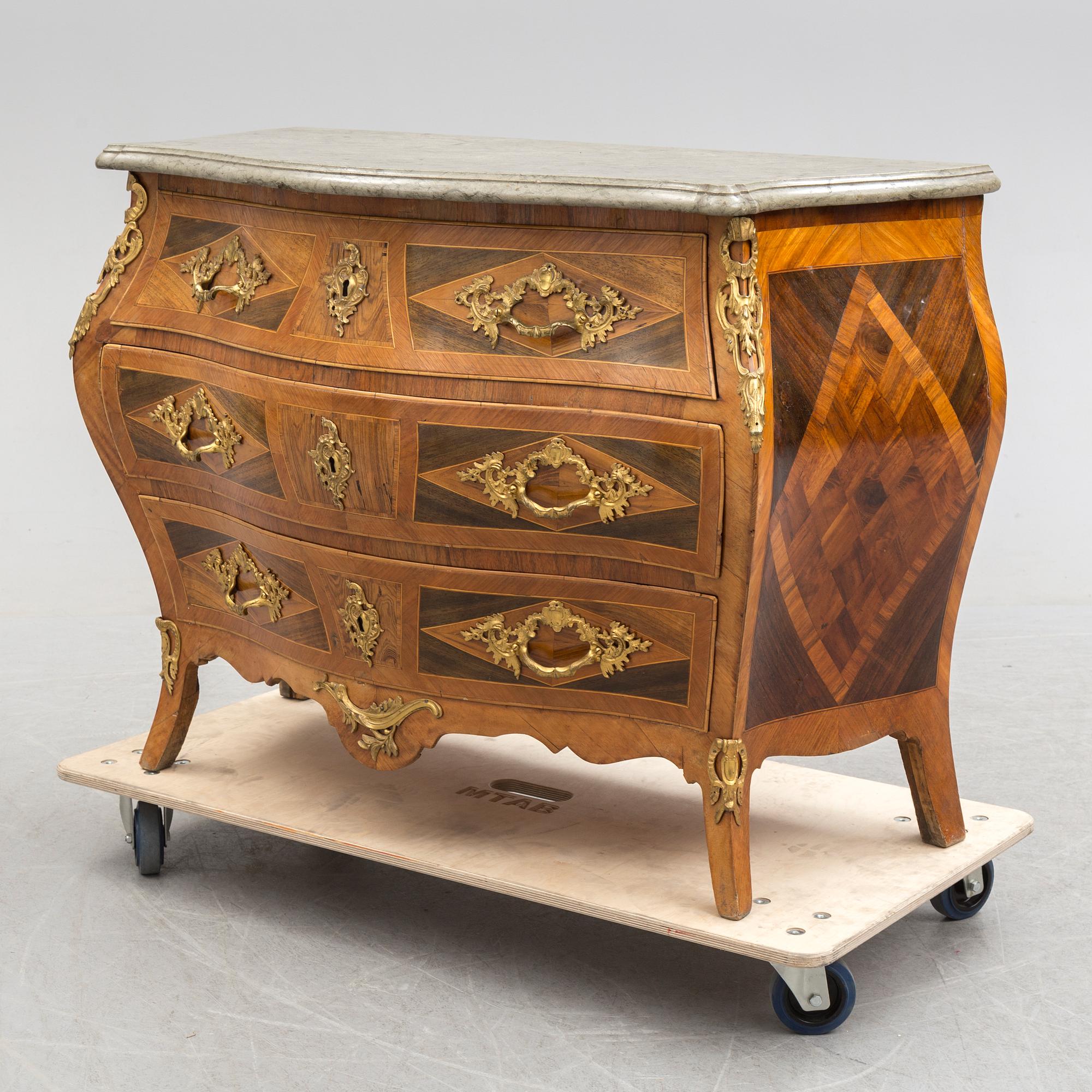 A Swedish Rococo 18th century commode by Gustaf Foltiern (master in Stockholm 1771-1804).