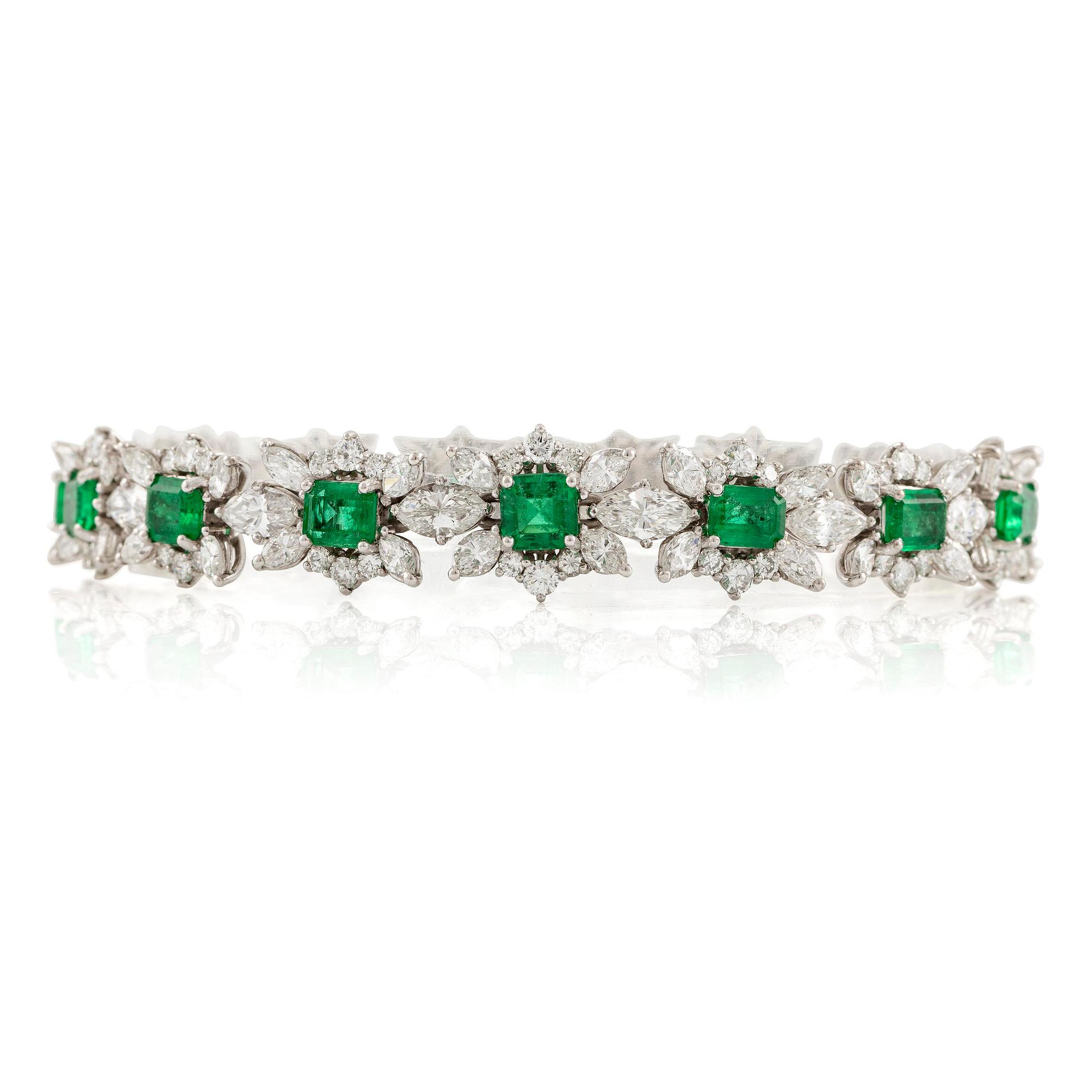 A bracelet in 18K white gold with step-cut emeralds and round and navette-shaped brilliant-cut diamonds.