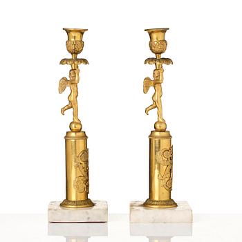 A pair of late Gustavian marble and omrolu candlesticks, late 18th century.