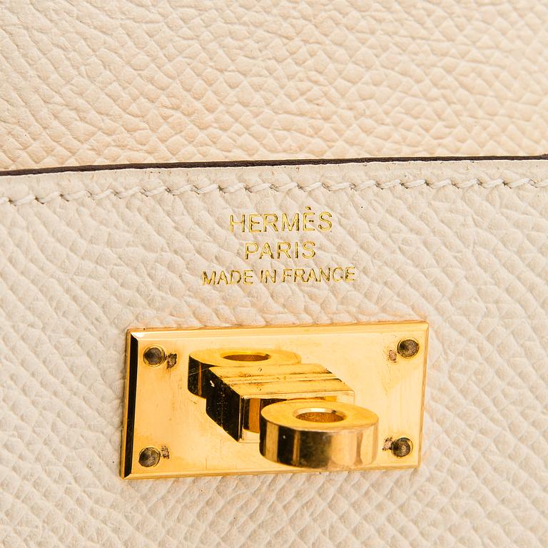 Hermès, plånbok "Kelly Pocket Compact" 2022.