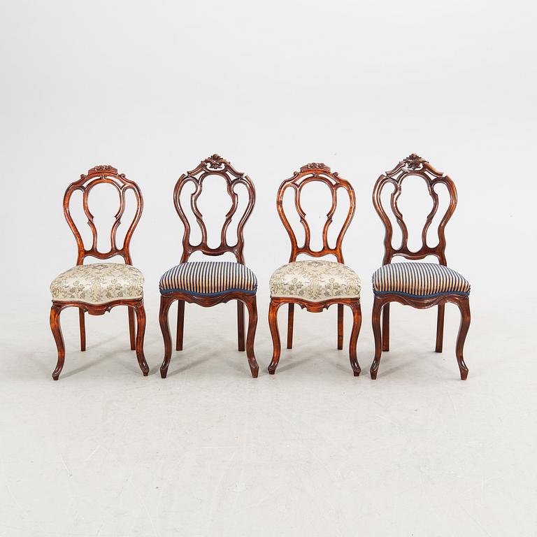 A set of six and two Neo Rococo mahogany chairs.