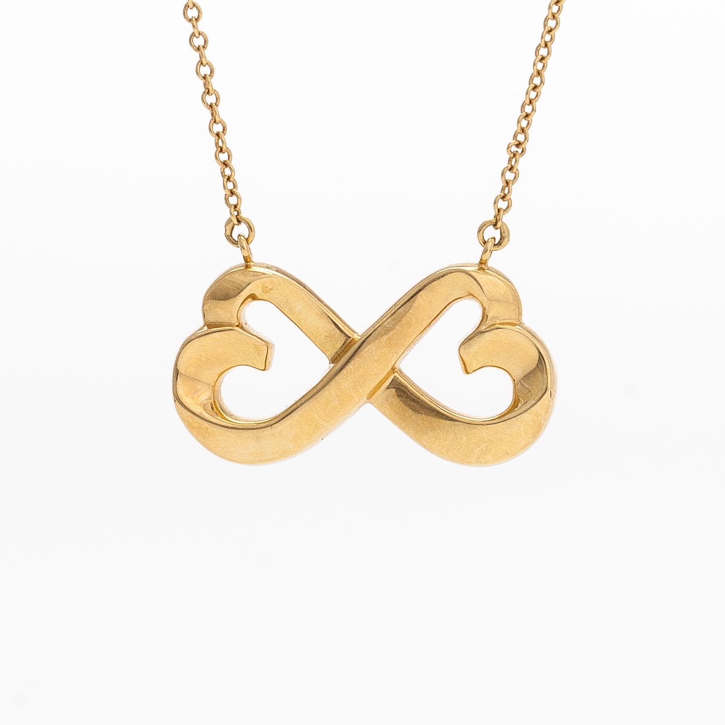 Tiffany & Co, Paloma Picasso, a "Double Loving Heart" necklace in 18K gold.
