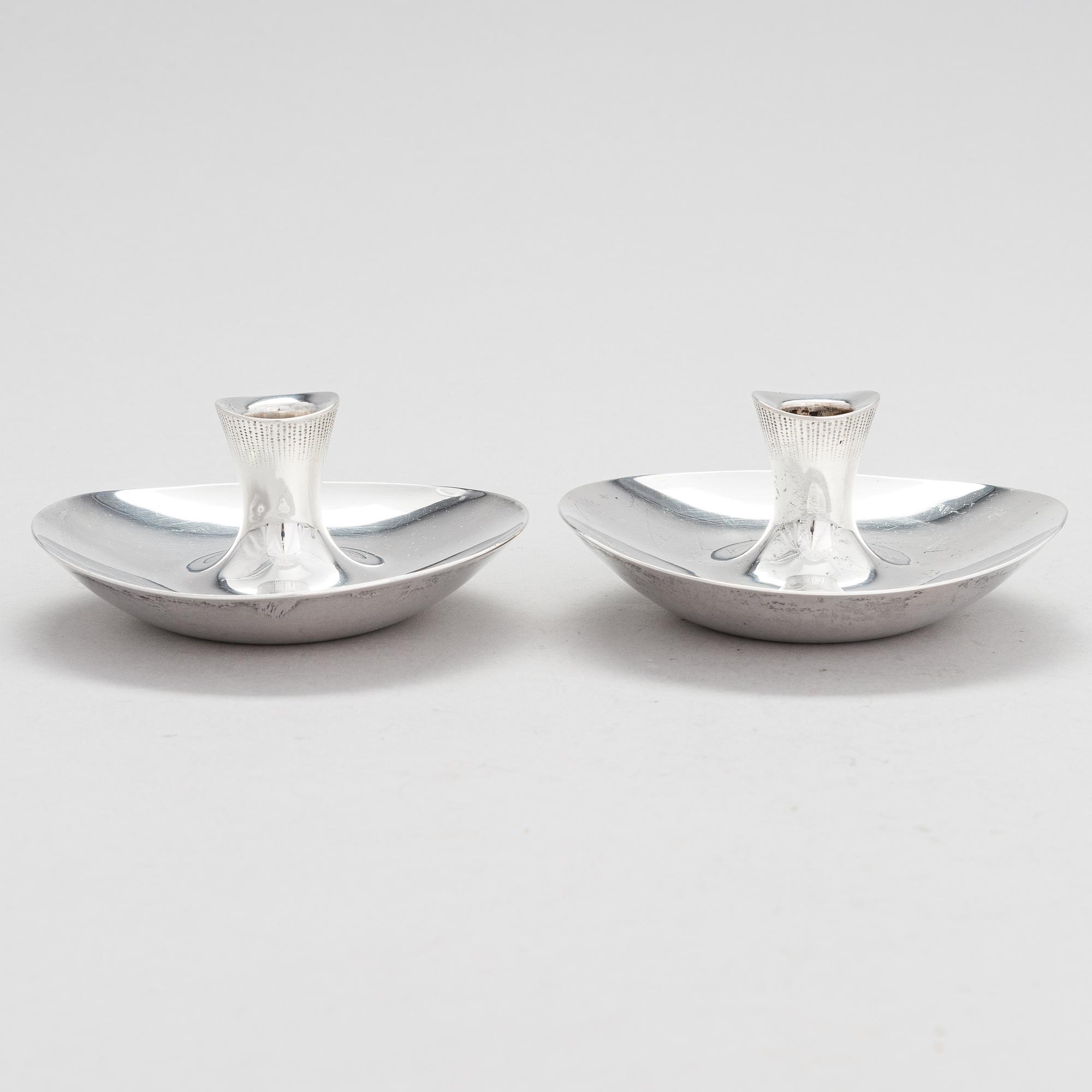 Tapio Wirkkala, Two candleholders, silver, Hopeatehdas, Helsinki 1957 and 1959.