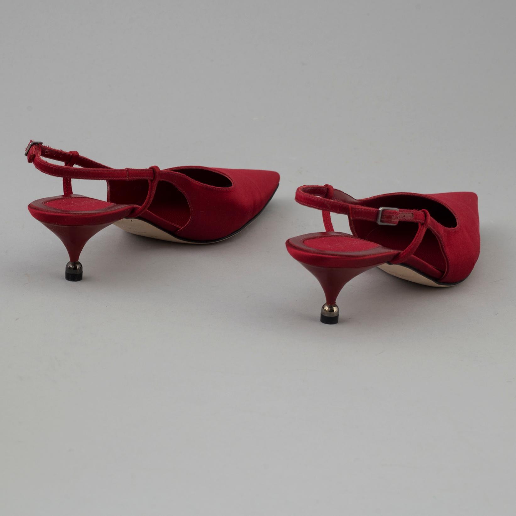 Red silk slingbacks by Sergio Rossi.