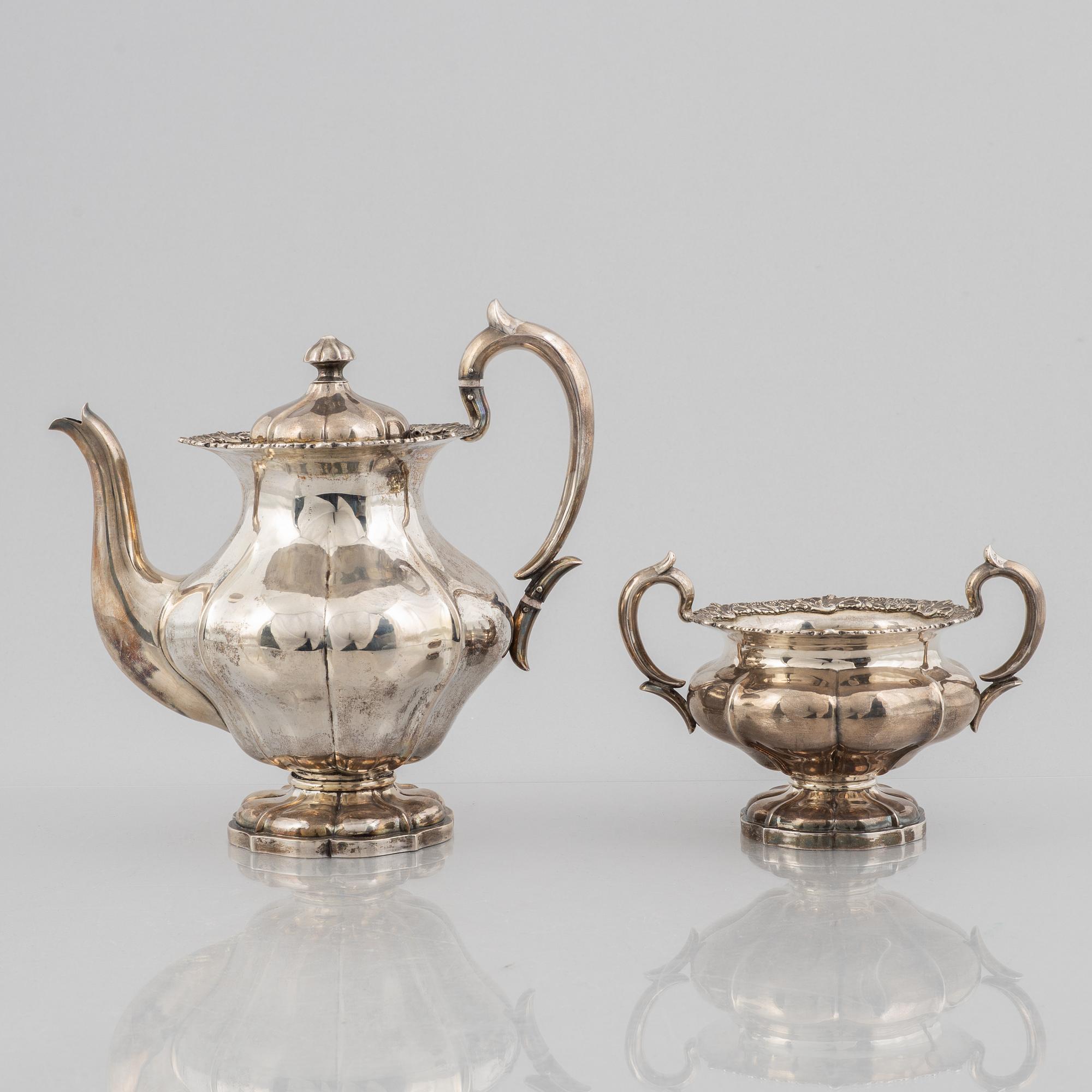 A silver coffee pot and a sugarbowl, marks of J. Mynttinen, Helsinki, Finland 1932.