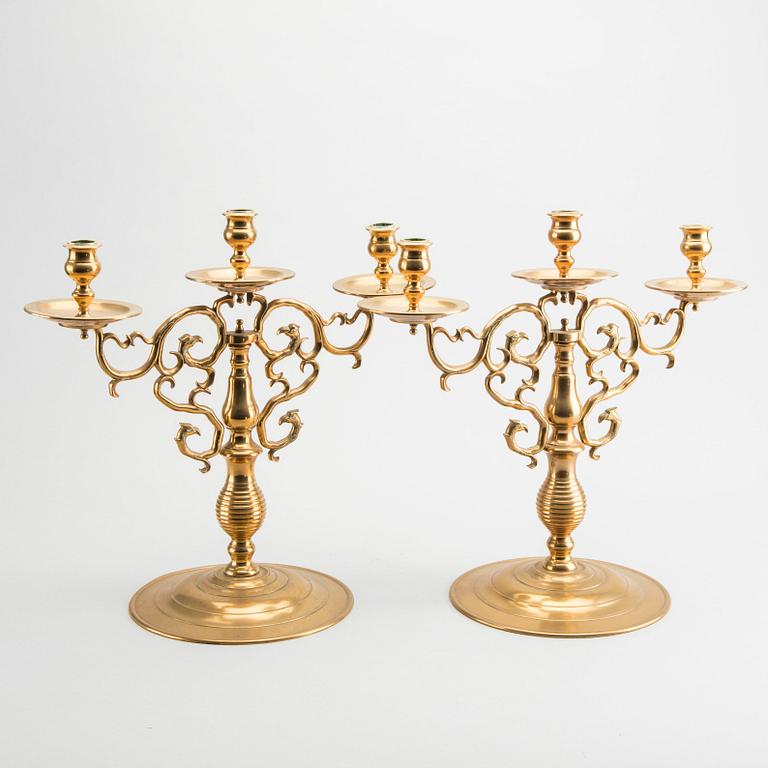 A pair of brass candelabras Gusum around 1900.