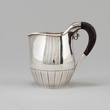 A"Cosmos", cream jug, sterling silver. Designed by Johan Rodhe for Georg Jensen, modell no 45E, weight 175 grams.