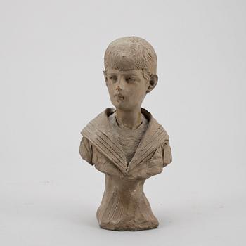 ALESSANDRO MORETTI, porträttbyst, lergods, signerad och daterad 1909.