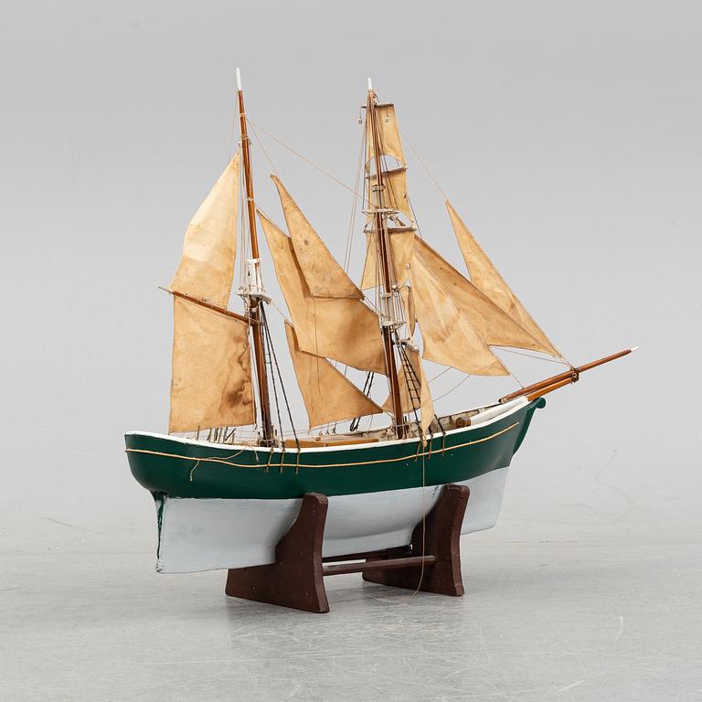 A model of a ship, mid 20th century.