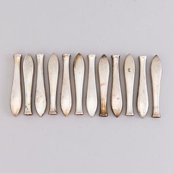 A 1920s 88-piece set of silver cutlery and 12 knife handles, Warsaw Poland.