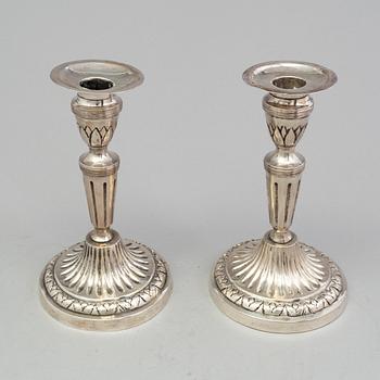 A pair of late 18th century silver candlesticks with unclear hallmarks, possibly from Germany. Weight ca 316 grams.
