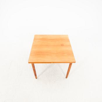 A teak table from the middle of the 20th century.
