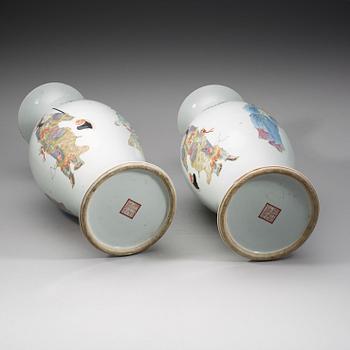 A pair of large Chinese famille rose vases, 20th Century with seal mark in red.