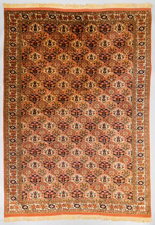 A carpet, semi-antique Mashad silk, circa 295 x 210.